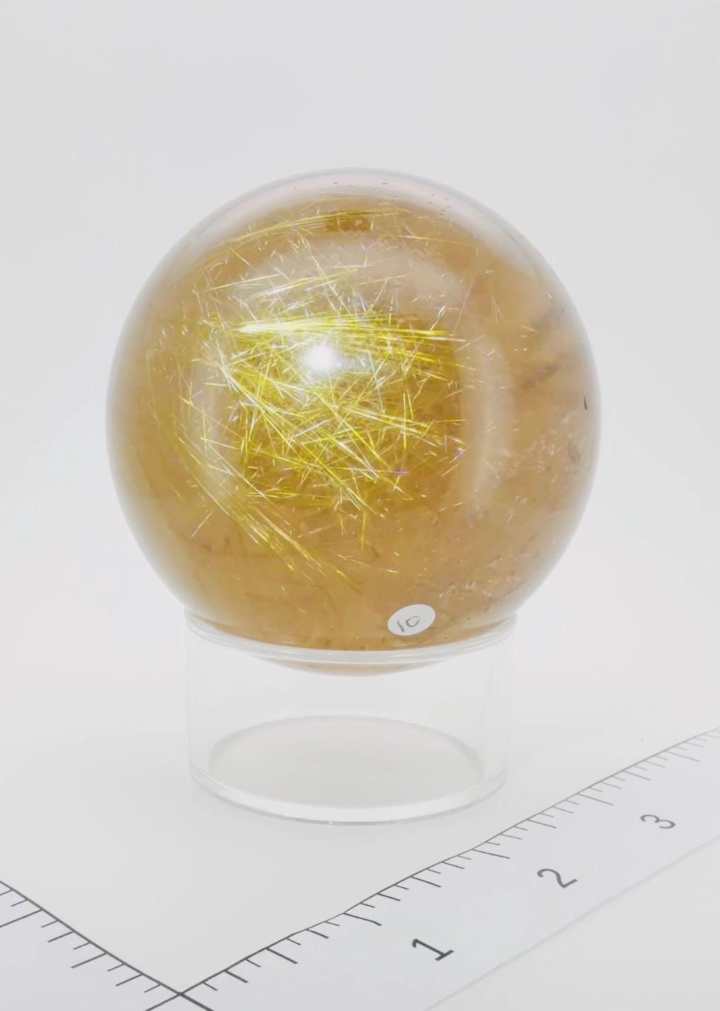 Large Smoky Golden Rutile Quartz Sphere with Shooting Star Formation — Brazil (Item No. 10)